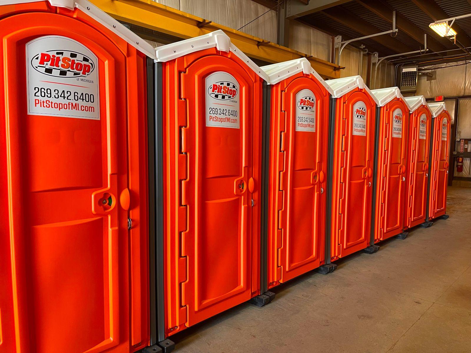line up of portable restrooms